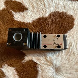 Atos Black and Silver Electronic Component